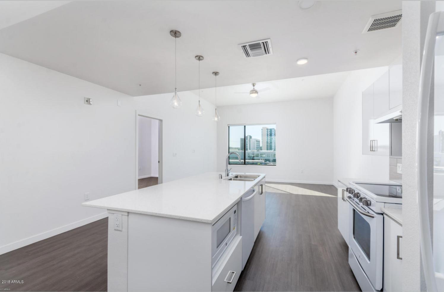 1130 North 2nd Street, Unit 310 Phoenix, AZ 85004 - Photo 4 of 20 KITCHEN AND LIVING ROOM