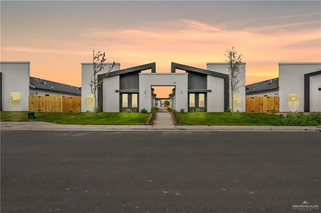 front view of a house with a street