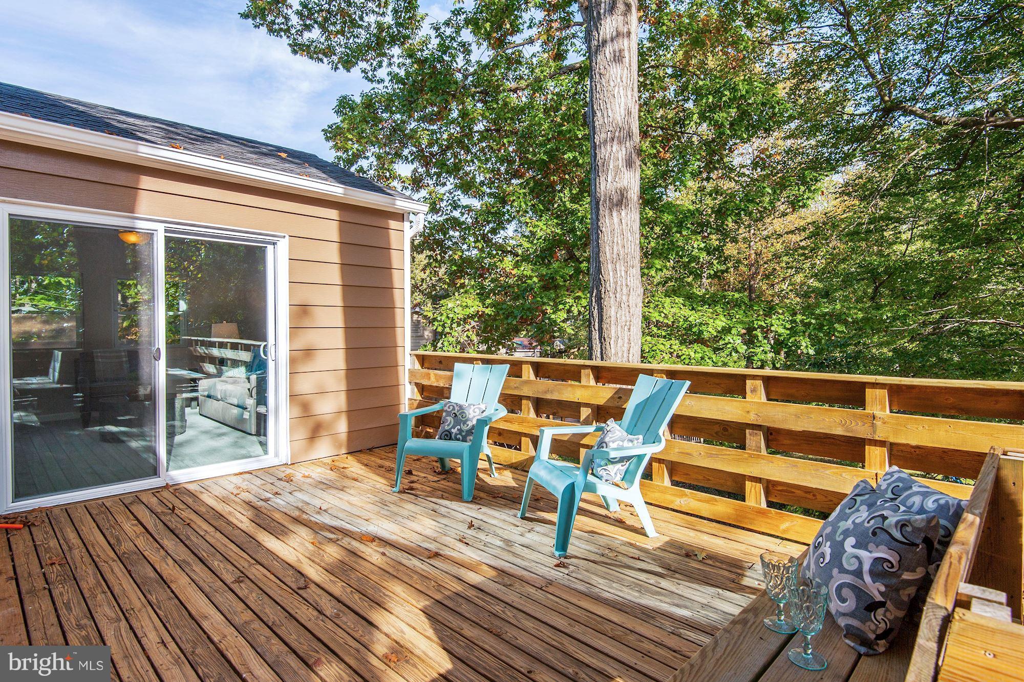8627 Thames Street Springfield, VA 22151 - Photo 13 of 30 a view of a patio with wooden floor
