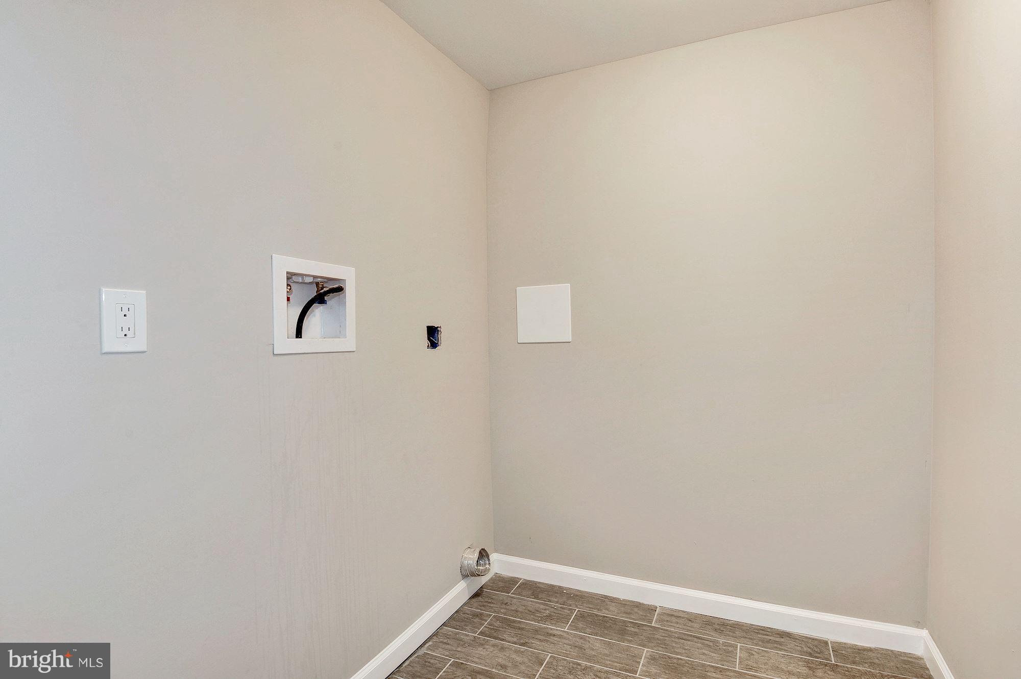 8627 Thames Street Springfield, VA 22151 - Photo 28 of 30 a view of a small space with window