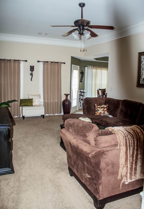 511 Bob White Road Macon, GA 31216 - Photo 13 of 29 a large bed sitting in a room next to a window