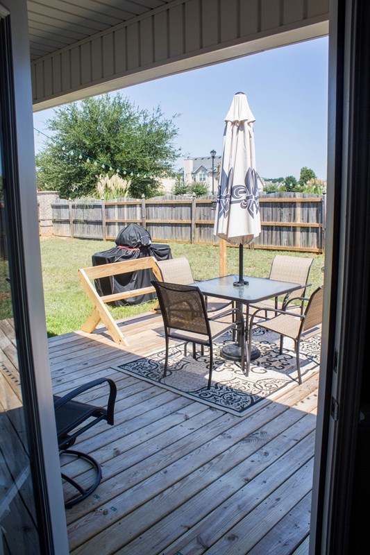 511 Bob White Road Macon, GA 31216 - Photo 25 of 29 a view of a balcony with two chairs and a table