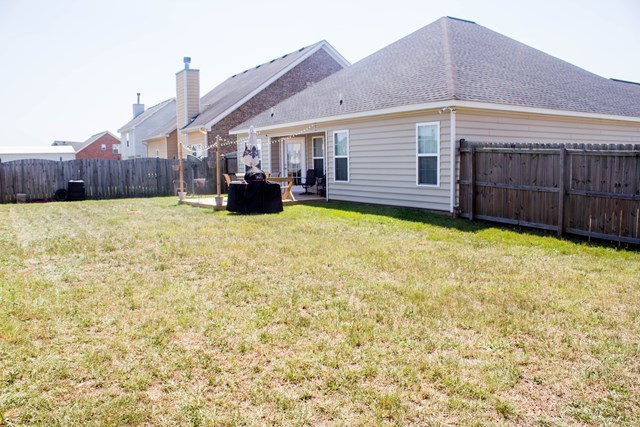 511 Bob White Road Macon, GA 31216 - Photo 29 of 29 a view of a house with a yard and sitting area