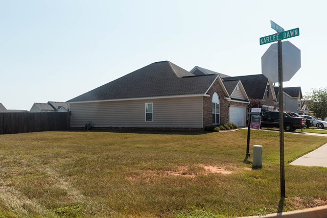 511 Bob White Road Macon, GA 31216 - Photo 5 of 29 a house that has a tree in front of it