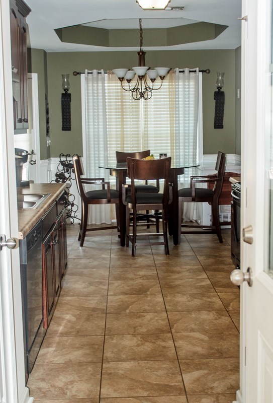 511 Bob White Road Macon, GA 31216 - Photo 7 of 29 a view of a dining room with furniture and window