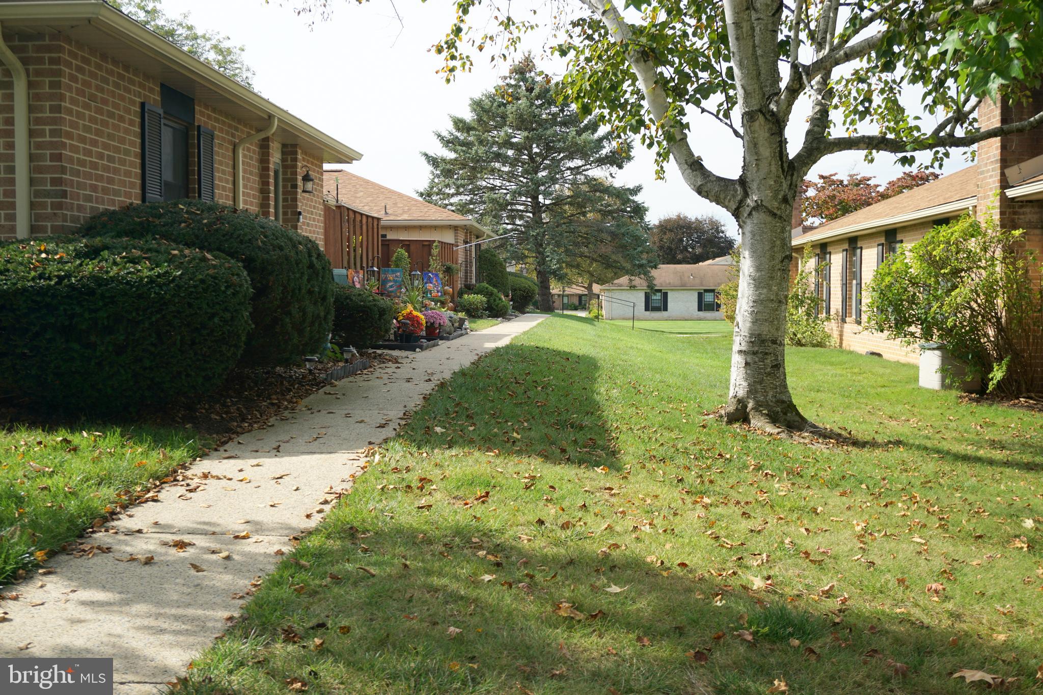 2834 Springhaven Place Macungie, PA 18062 - Photo 18 of 19 a view of a yard in front of house