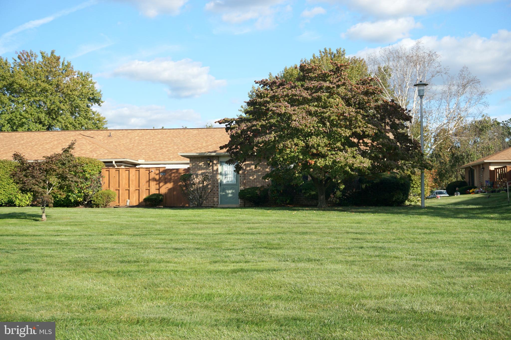 2834 Springhaven Place Macungie, PA 18062 - Photo 2 of 19 a view of a green yard