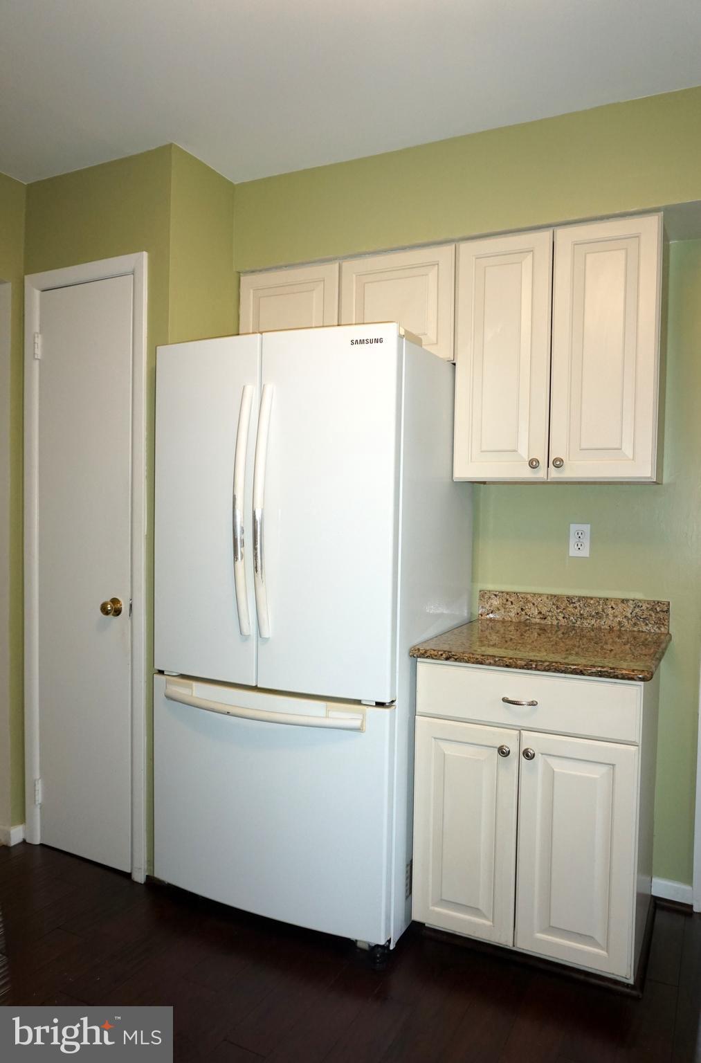 2834 Springhaven Place Macungie, PA 18062 - Photo 7 of 19 a white refrigerator freezer sitting in a kitchen