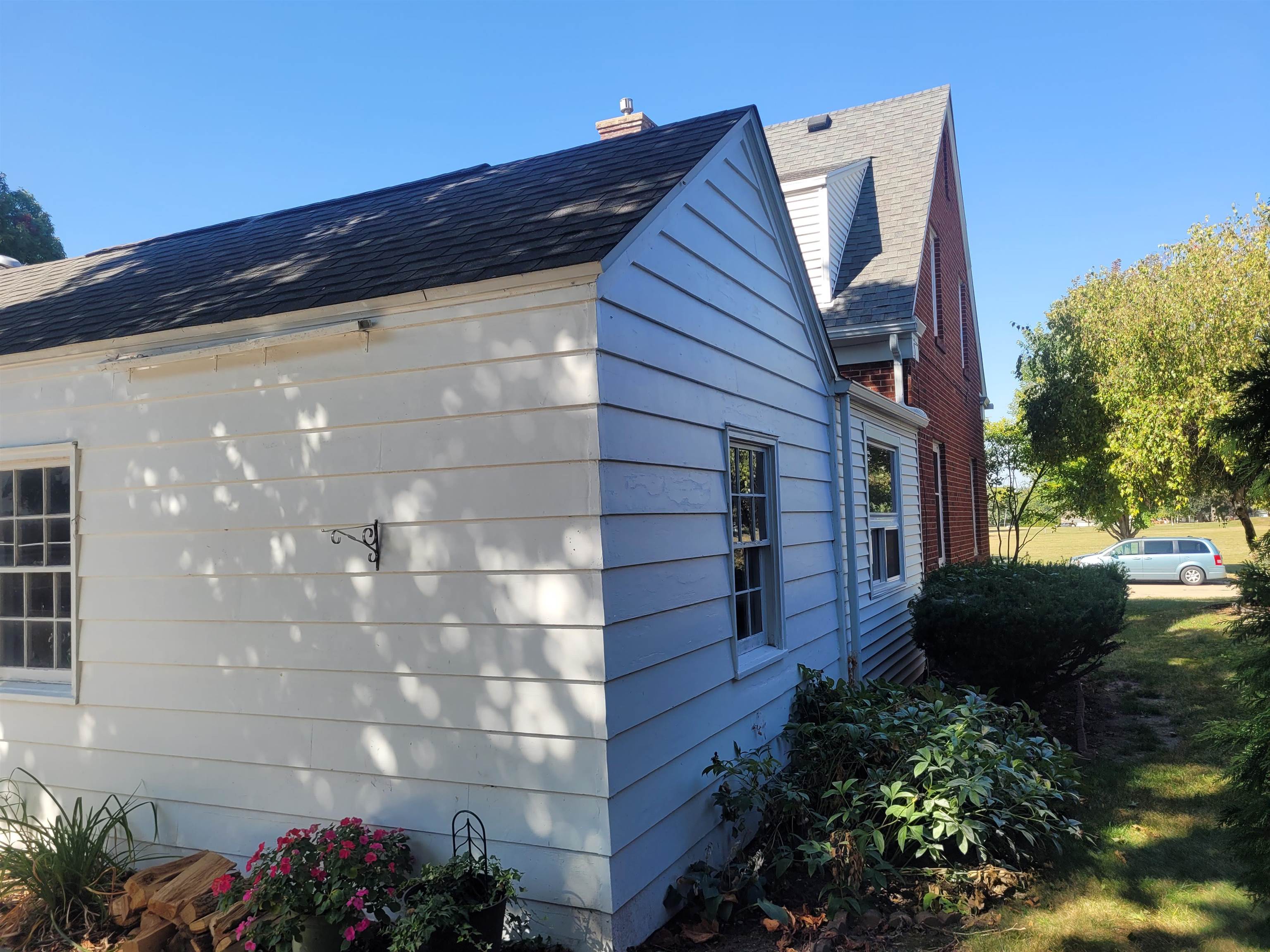 509 West 14th Street Sterling, IL 61081 - Photo 12 of 70 a front view of a house with a yard