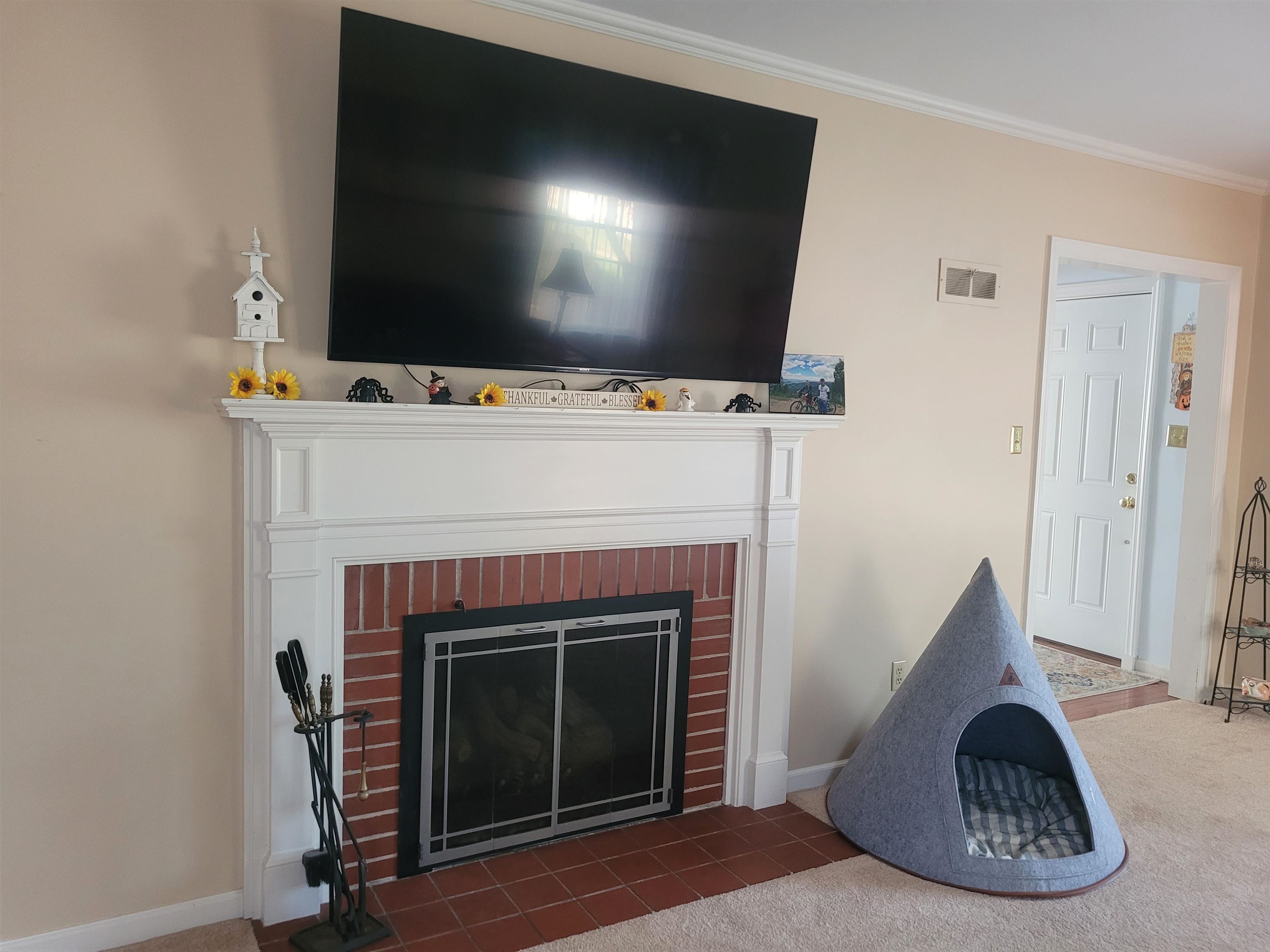 509 West 14th Street Sterling, IL 61081 - Photo 35 of 70 a living room with furniture and a fireplace