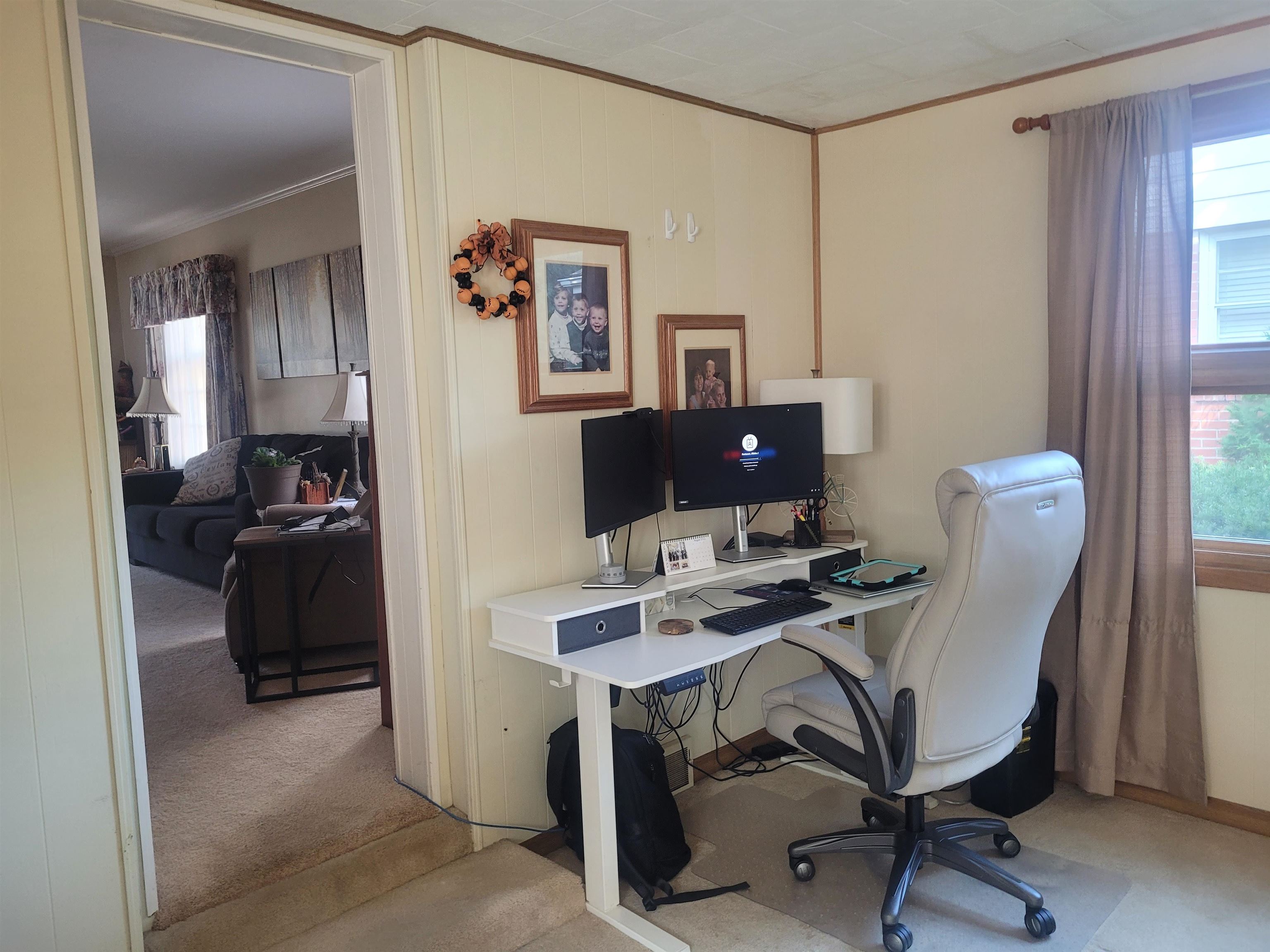 509 West 14th Street Sterling, IL 61081 - Photo 40 of 70 a view of a workspace with furniture and a window