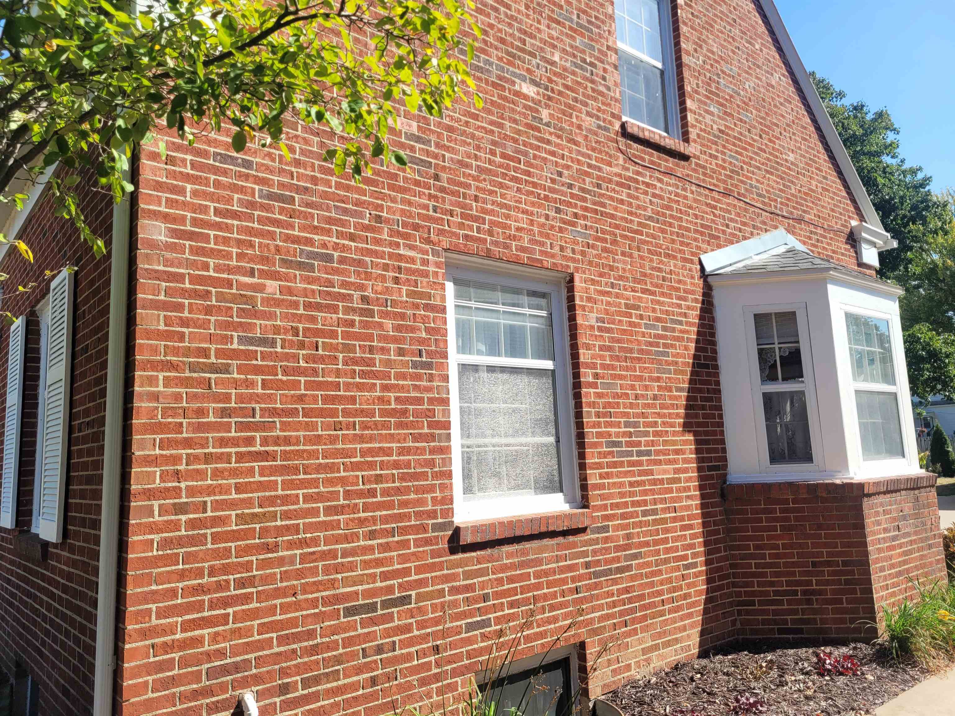 509 West 14th Street Sterling, IL 61081 - Photo 5 of 70 a view of a brick house with a window