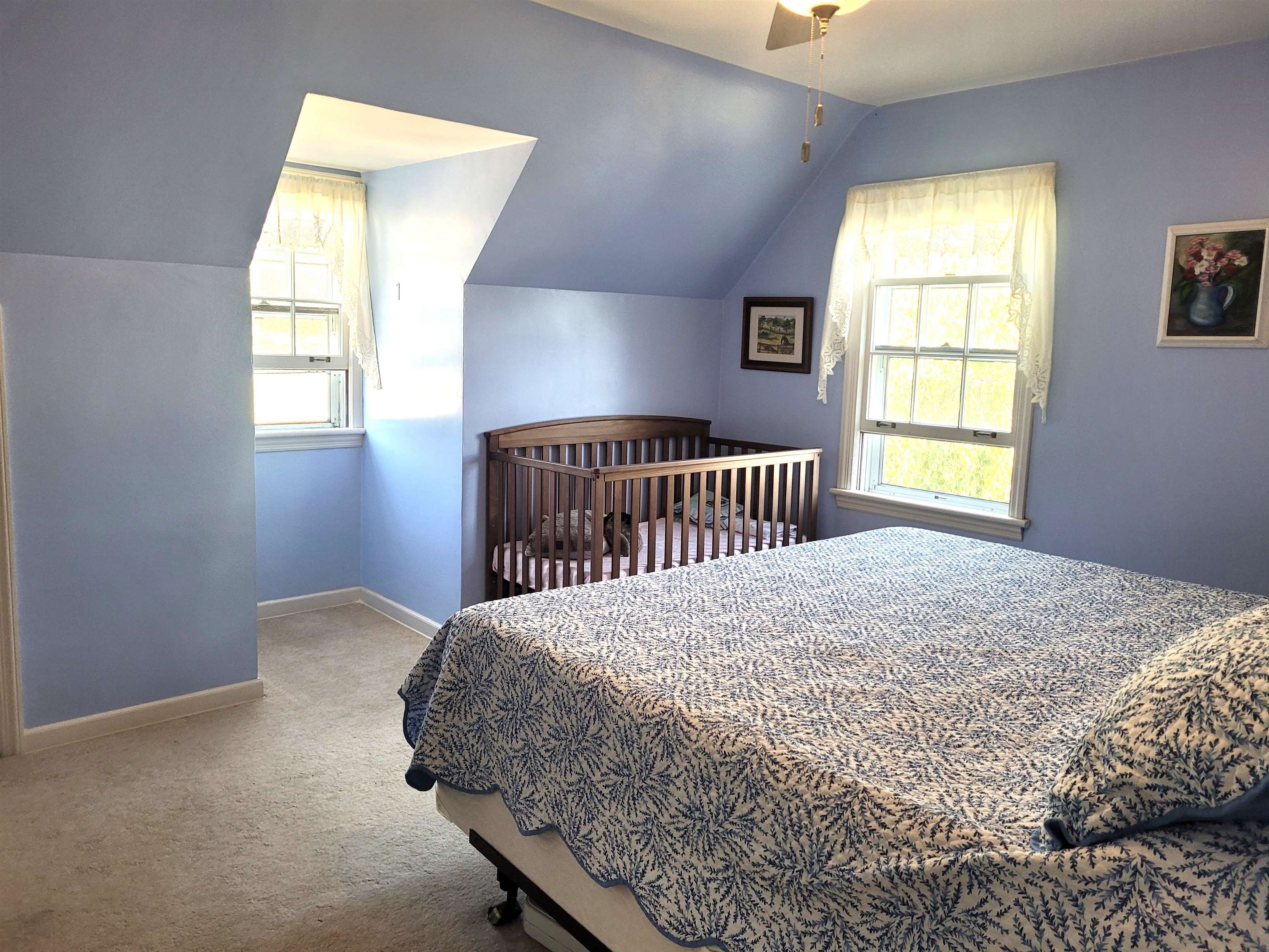 509 West 14th Street Sterling, IL 61081 - Photo 58 of 70 a bedroom with a bed and a window