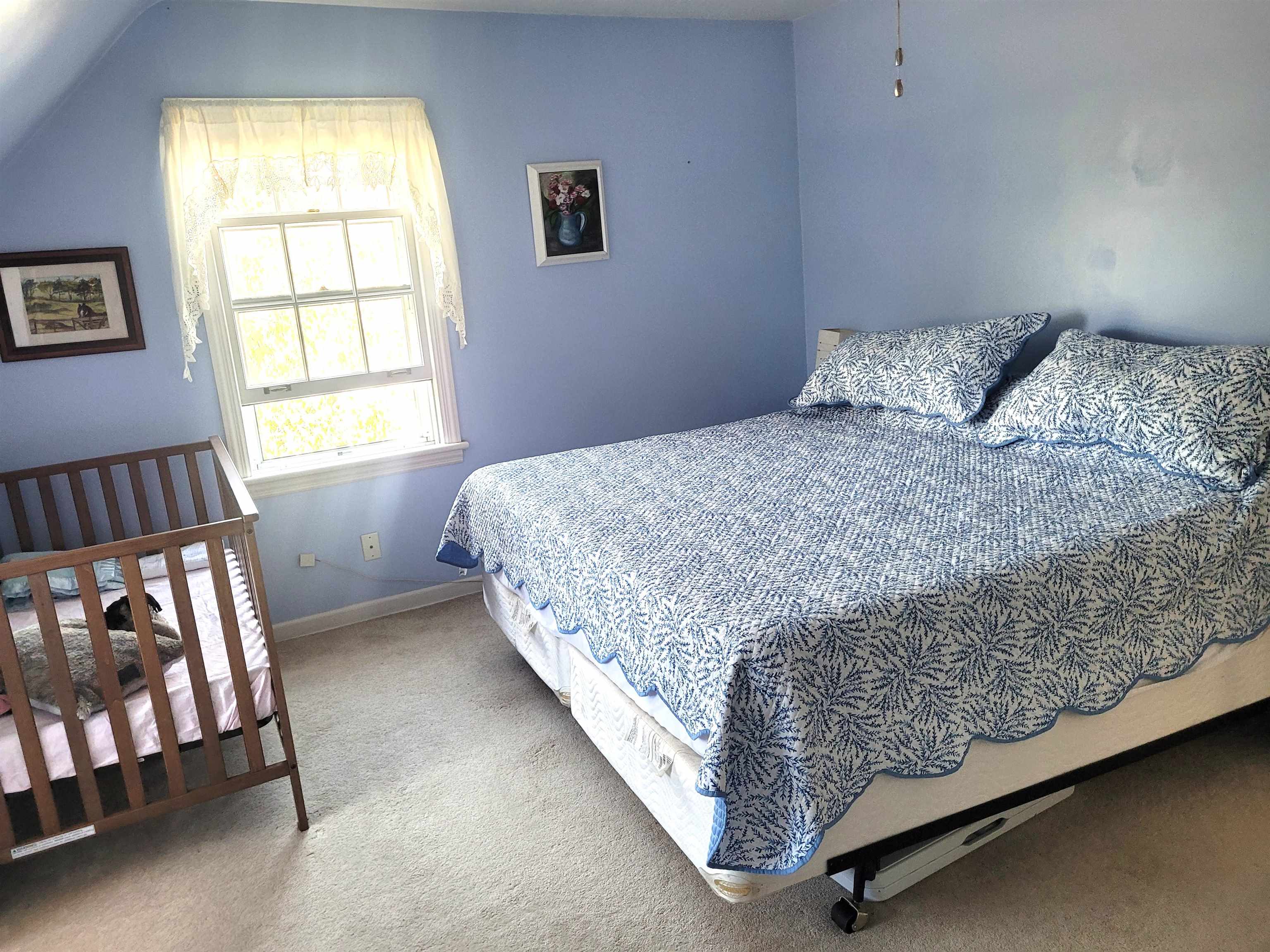 509 West 14th Street Sterling, IL 61081 - Photo 59 of 70 a bedroom with a bed and a window