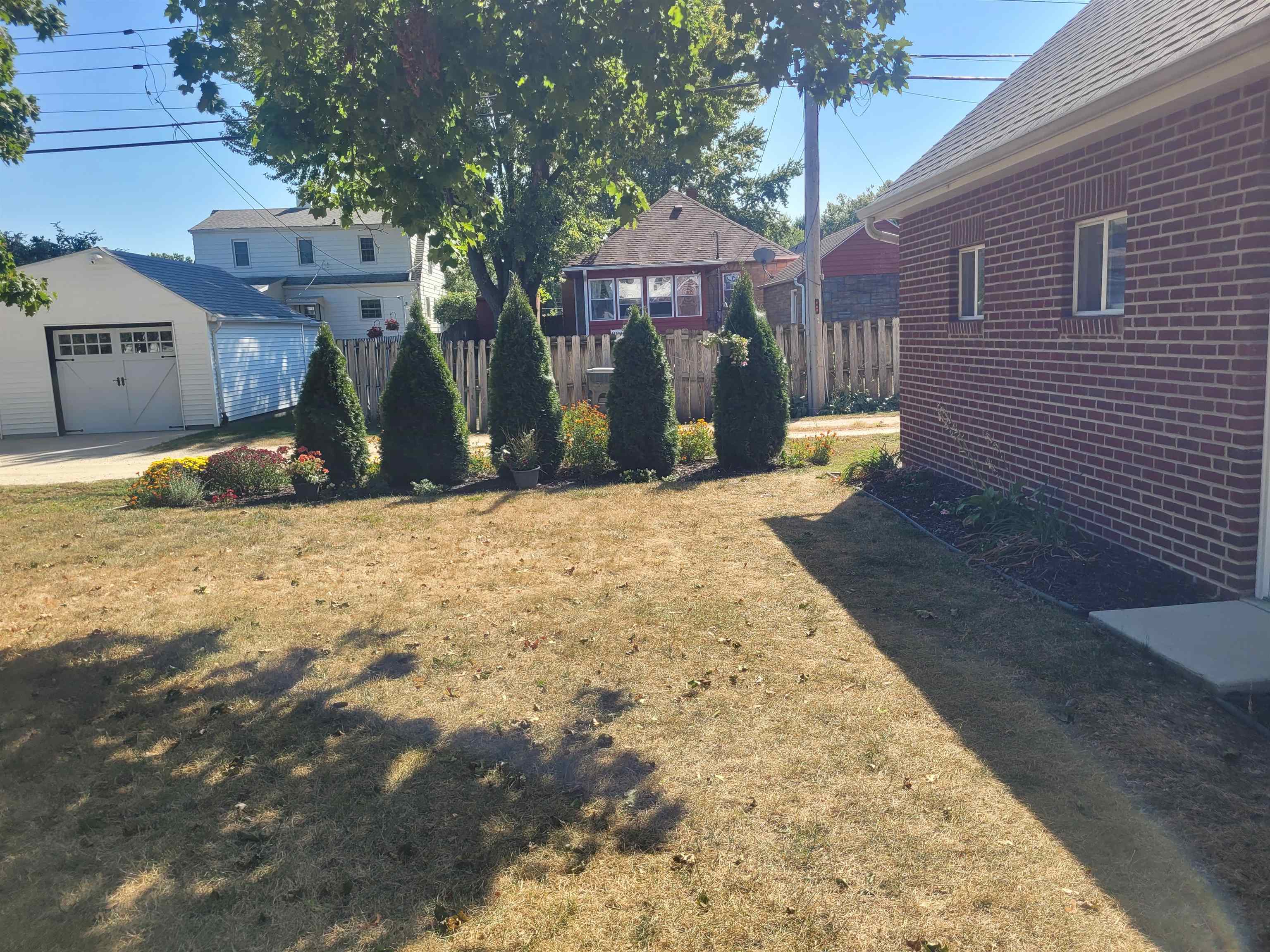 509 West 14th Street Sterling, IL 61081 - Photo 9 of 70 a view of a house with a snow on the road
