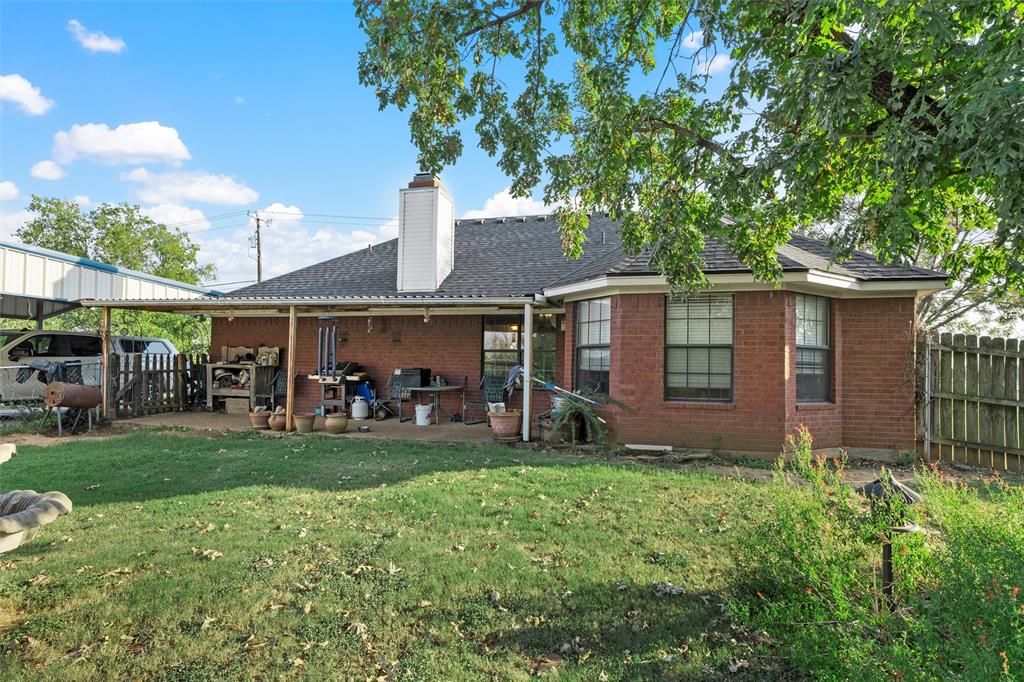 10829 China Spring Road Waco, TX 76708 - Photo 16 of 27 a view of a house with a yard porch and sitting area