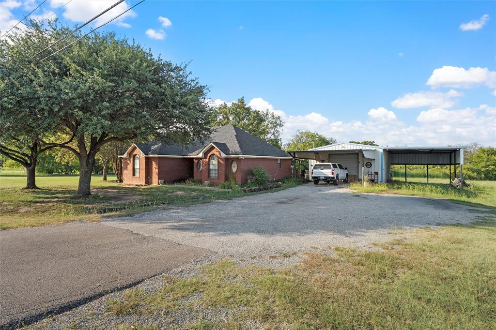 10829 China Spring Road Waco, TX 76708 - Photo 3 of 27 a view of street with house in background