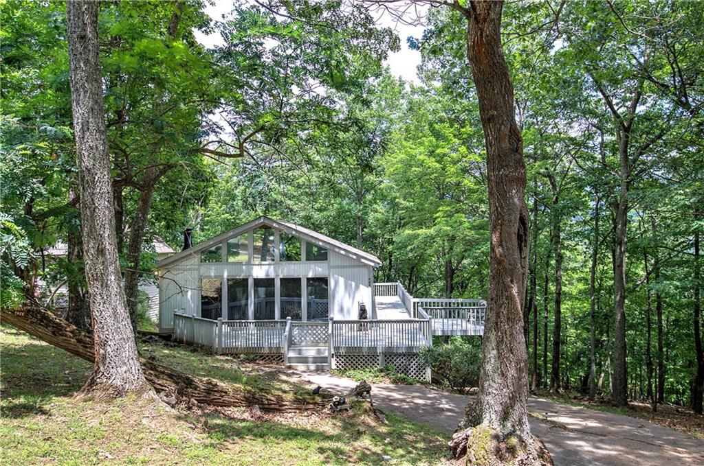 a house with trees in the background