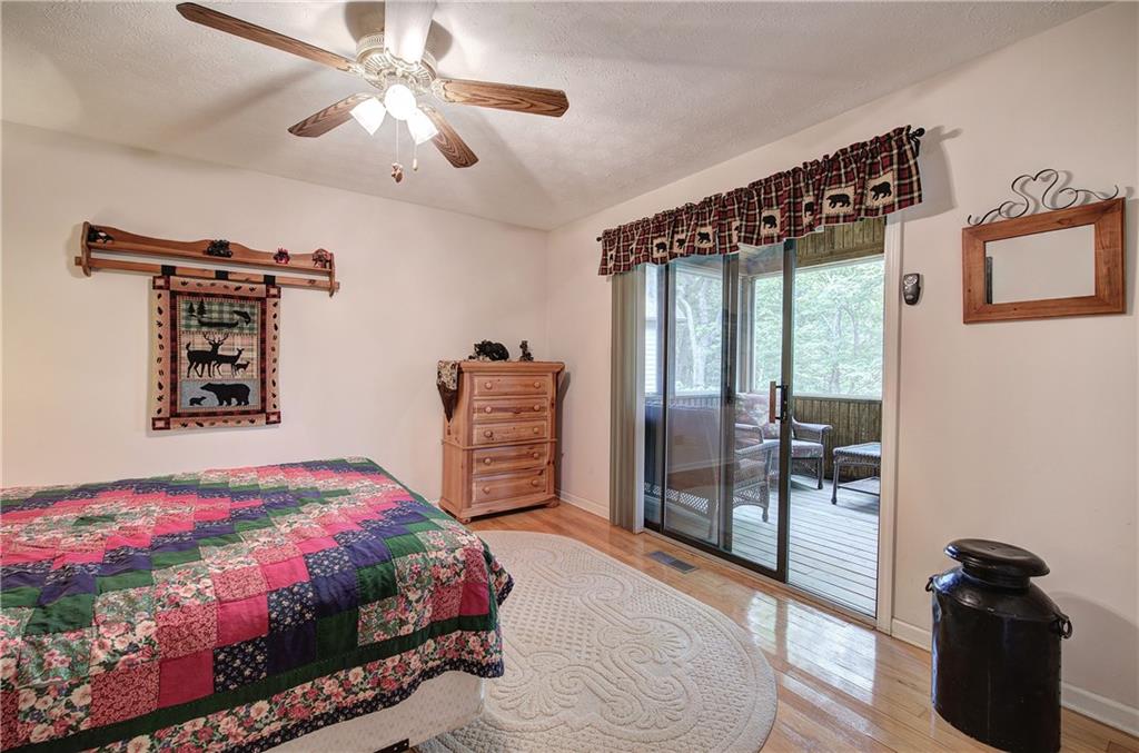 214 South View Trail Jasper, GA 30143 - Photo 18 of 72 a bedroom with a bed and a closet