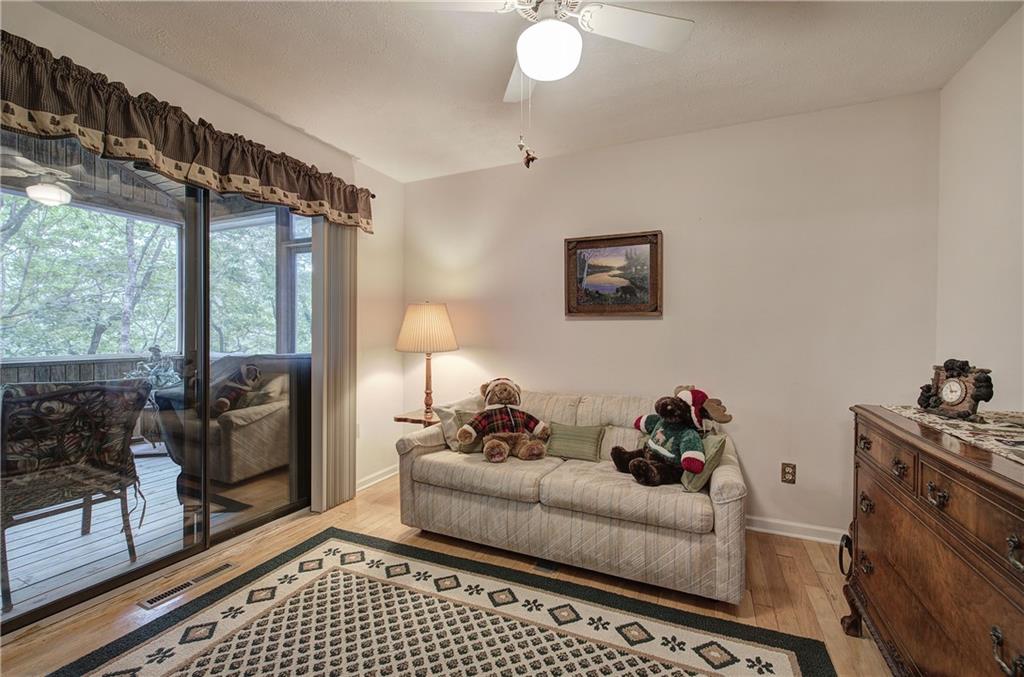 214 South View Trail Jasper, GA 30143 - Photo 22 of 72 a living room with furniture and a window