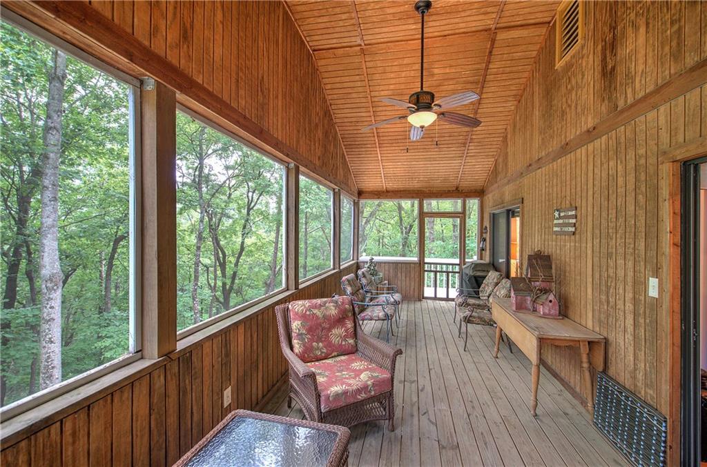 214 South View Trail Jasper, GA 30143 - Photo 25 of 72 a balcony with wooden floor and outdoor seating
