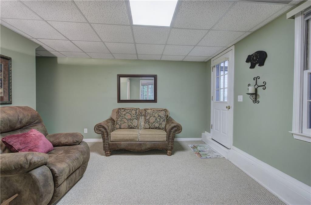 214 South View Trail Jasper, GA 30143 - Photo 31 of 72 a living room with furniture and a walk in closet