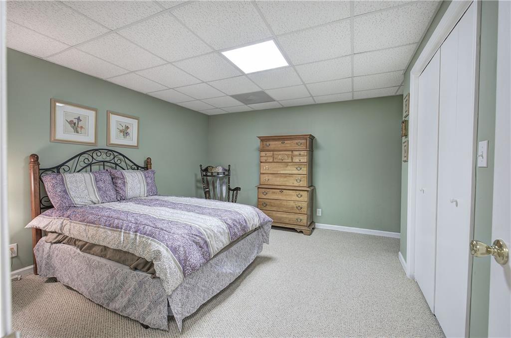 214 South View Trail Jasper, GA 30143 - Photo 41 of 72 a bedroom with a bed and a closet