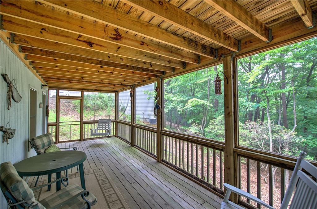 214 South View Trail Jasper, GA 30143 - Photo 45 of 72 a view of a porch with furniture and wooden floor