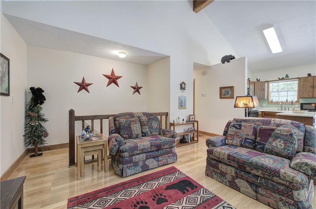 214 South View Trail Jasper, GA 30143 - Photo 9 of 72 a living room with furniture and wooden floor