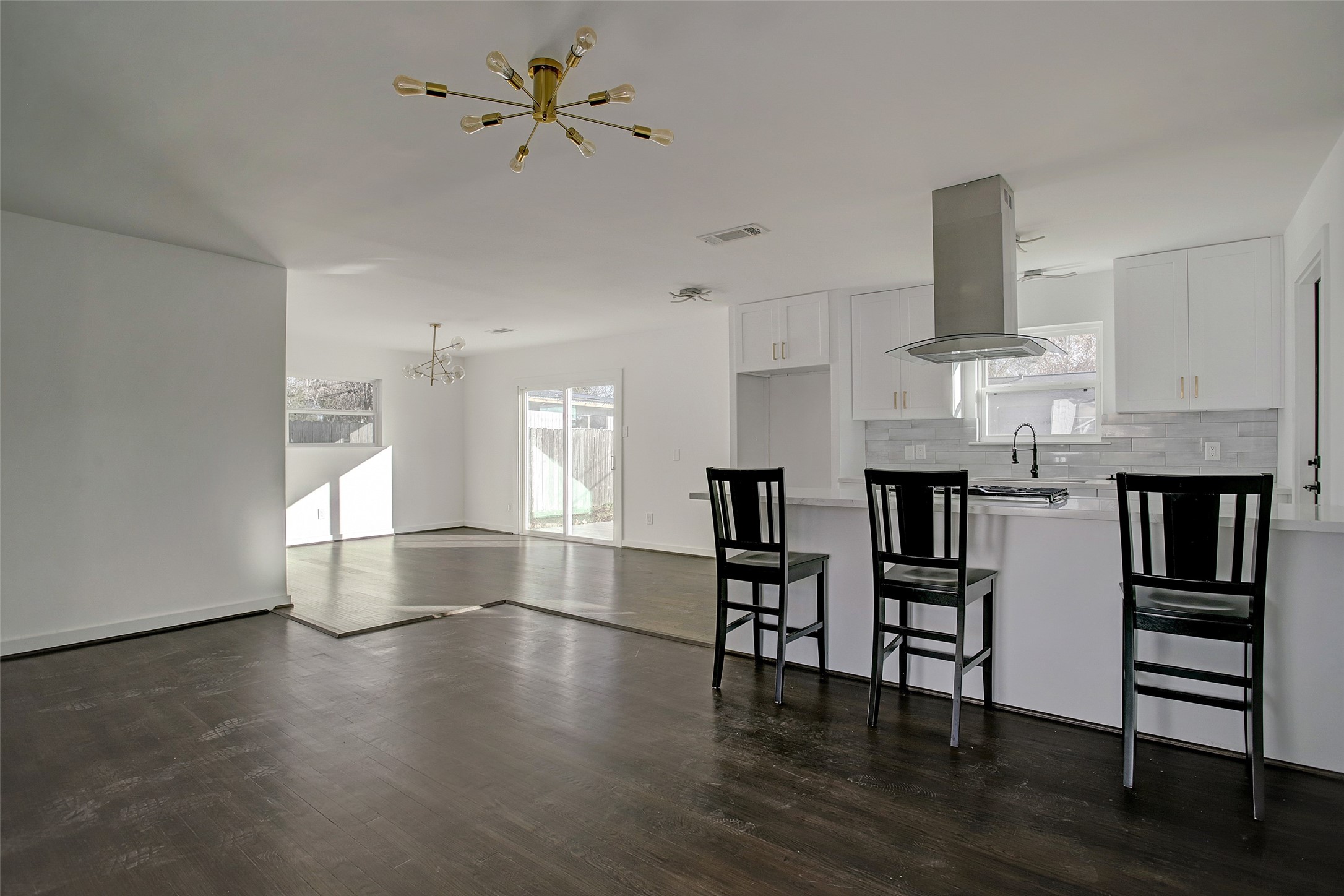 5531 Jason Street Houston, TX 77096 - Photo 4 of 8 a view of dining room with furniture and wooden floor