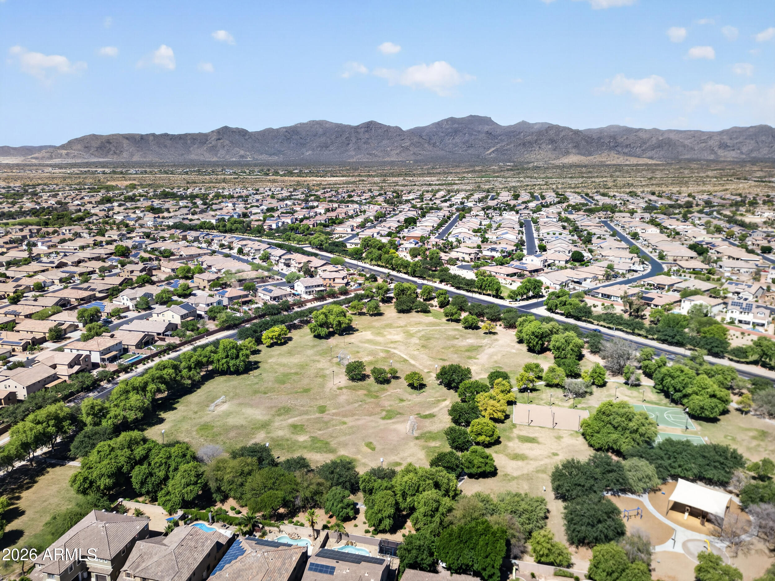 18612 West Mountain View Road Waddell, AZ 85355 - Photo 70 of 71 a view of a city with a mountain