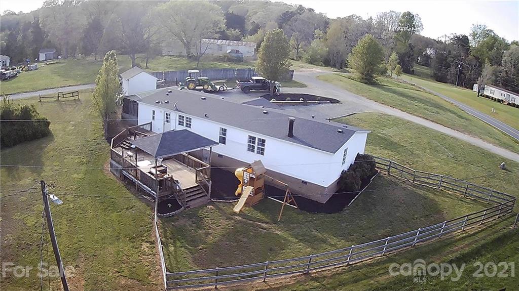 7815 Stokes Ferry Road Salisbury, NC 28146 - Photo 14 of 14 an aerial view of a house with outdoor space