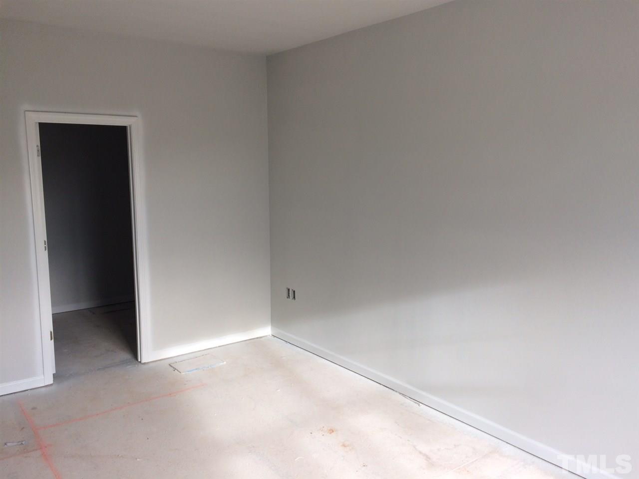 6103 Beale Loop, Unit 43 CARLTON Raleigh, NC 27616 - Photo 8 of 16 a view of an empty room