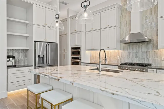 a living room with a couch and a table