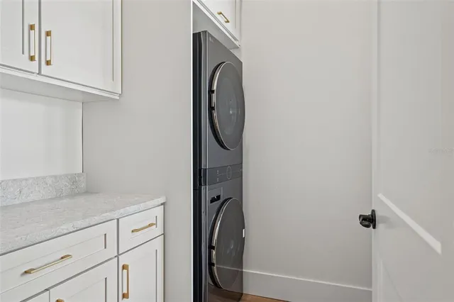 a view of an empty room and a window