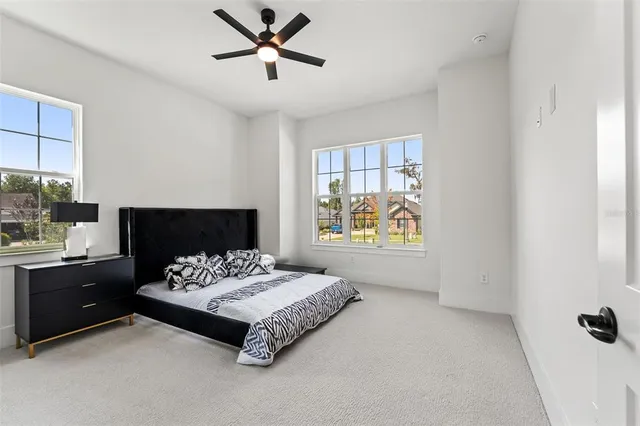 a view of an outdoor space with swimming pool and sitting area