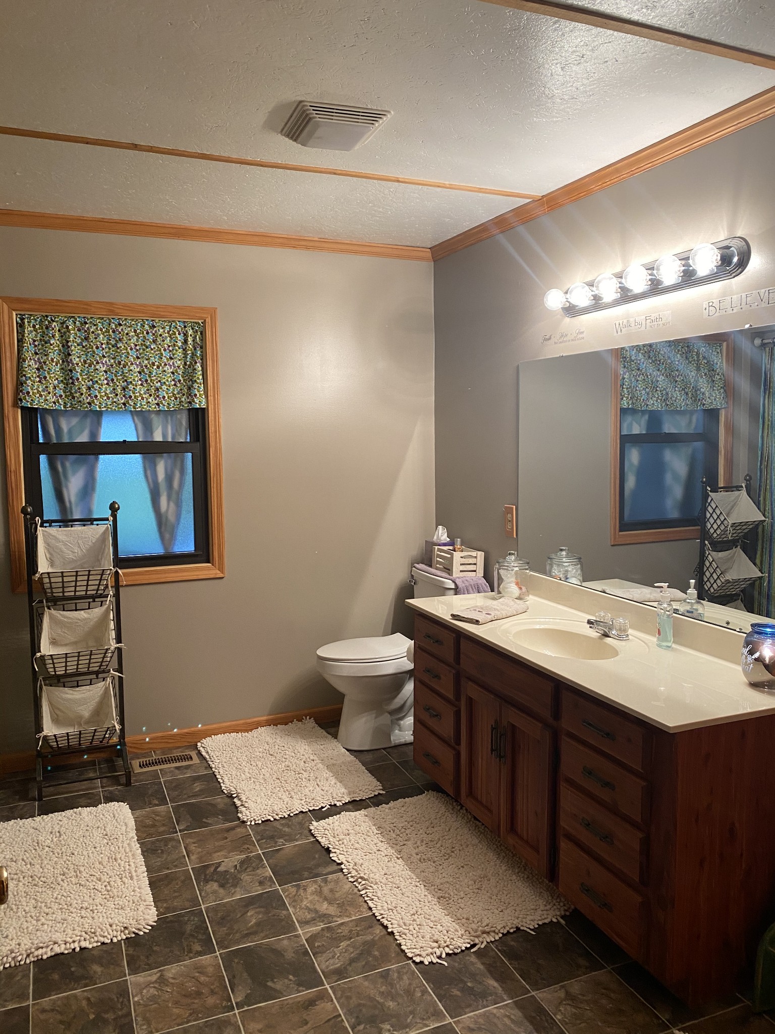 1971 Greenbriar Road Waverly, TN 37185 - Photo 16 of 39 a bathroom with a sink and a mirror