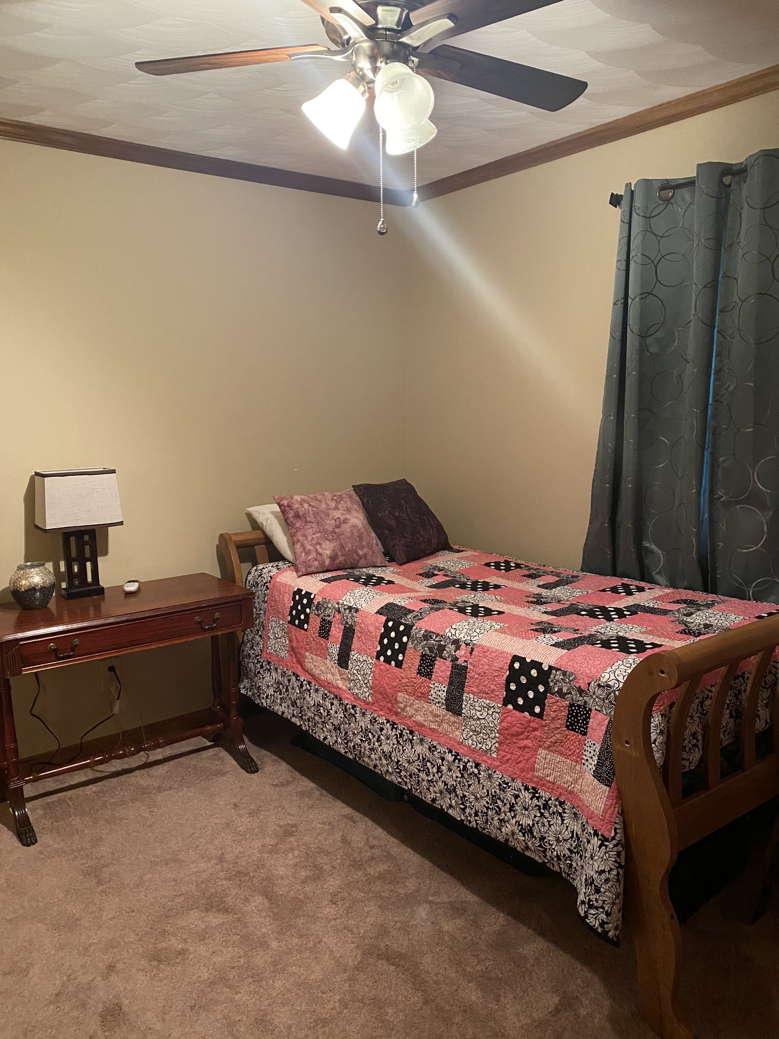 1971 Greenbriar Road Waverly, TN 37185 - Photo 18 of 39 a bedroom with a bed and a table
