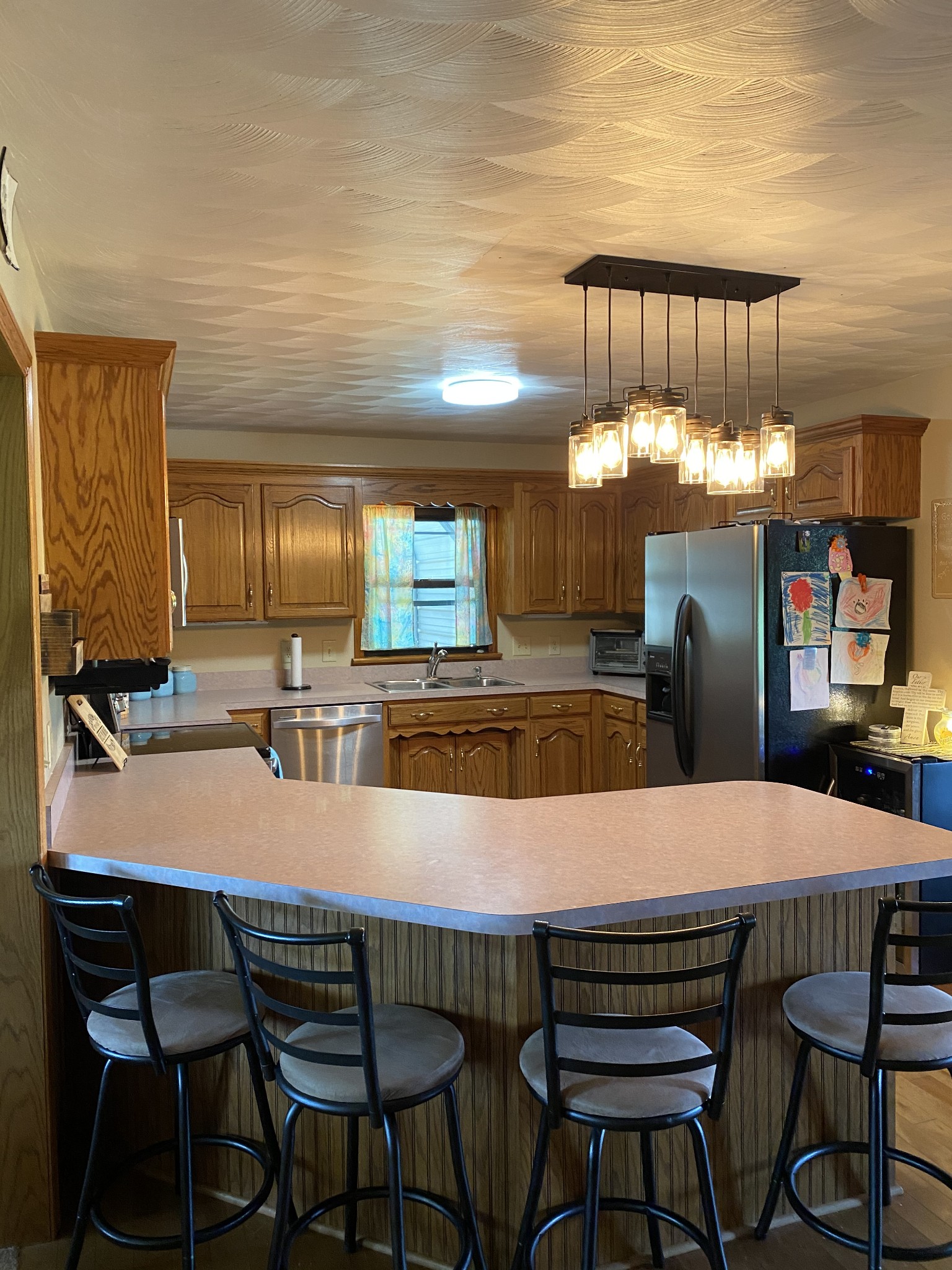 1971 Greenbriar Road Waverly, TN 37185 - Photo 21 of 39 a large kitchen with a table and chairs