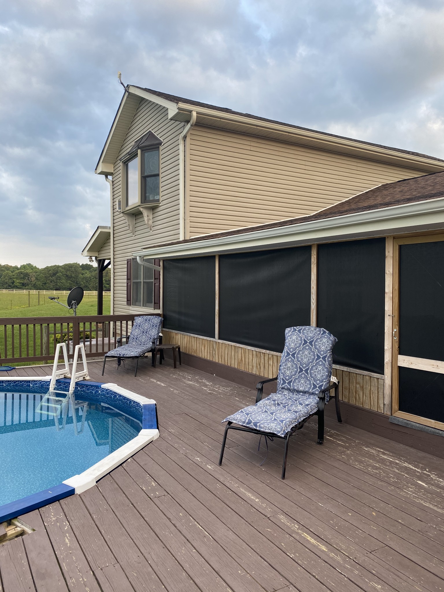 1971 Greenbriar Road Waverly, TN 37185 - Photo 5 of 39 a swimming pool with outdoor seating and wooden floor