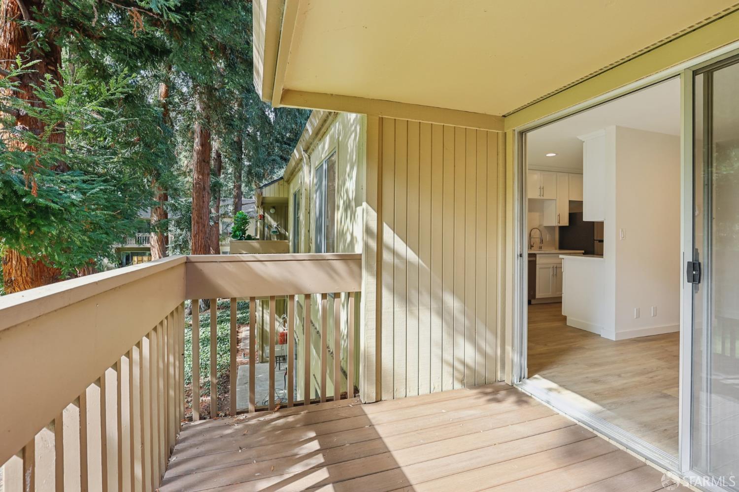 505 Cypress Point Drive, Unit 40 Mountain View, CA 94043 - Photo 14 of 34 a view of a balcony with wooden floor and stairs