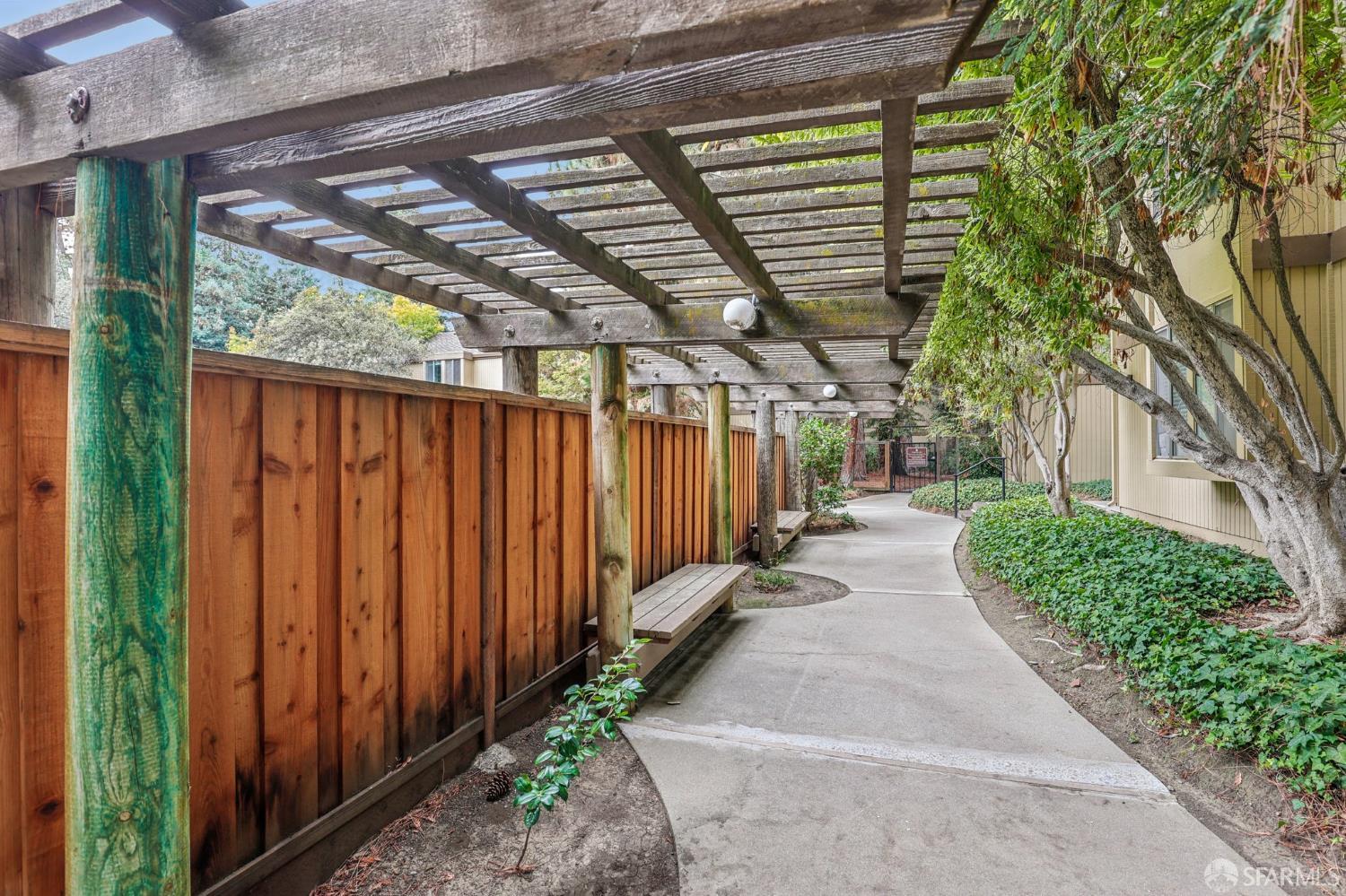 505 Cypress Point Drive, Unit 40 Mountain View, CA 94043 - Photo 20 of 34 a view of a backyard with pathway