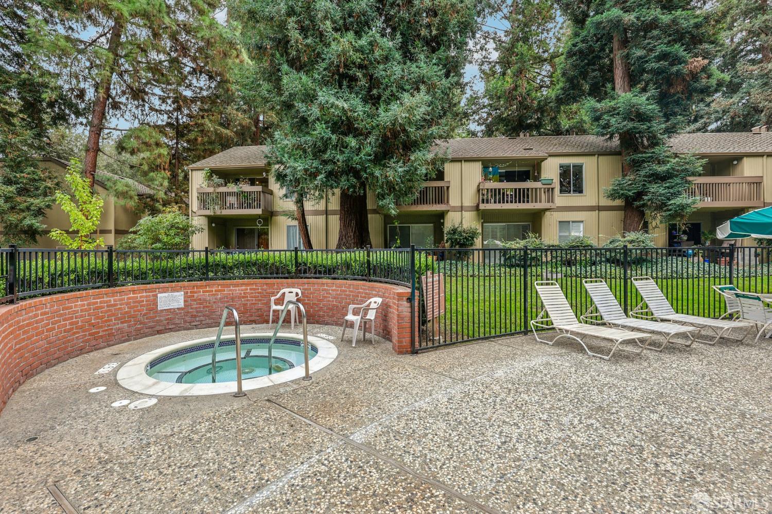 505 Cypress Point Drive, Unit 40 Mountain View, CA 94043 - Photo 23 of 34 a view of a house with a swimming pool