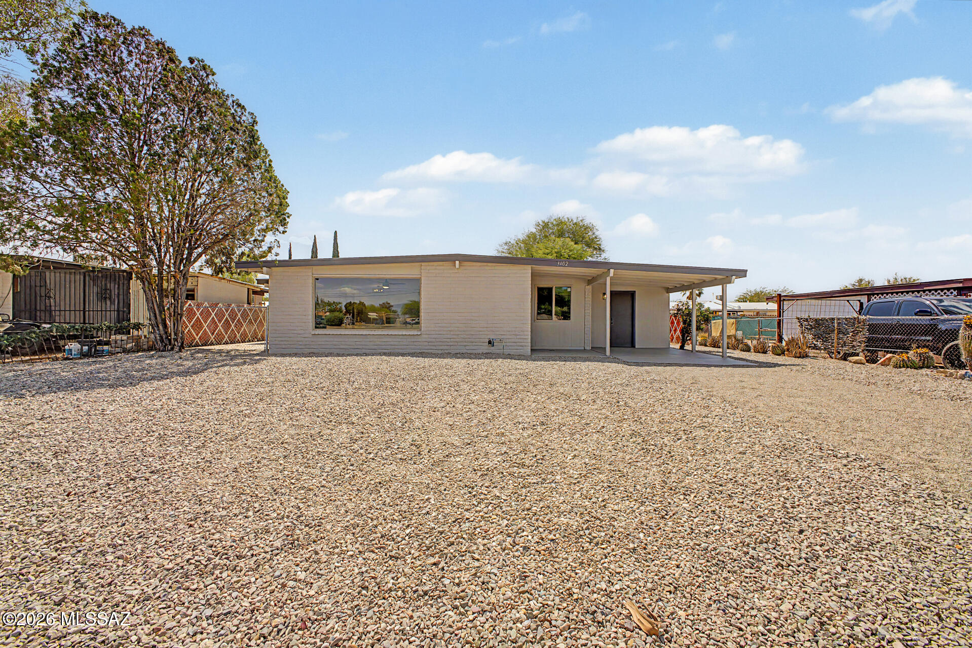 3402 South Kolb Road Tucson, AZ 85730 - Photo 1 of 32 a front view of a building with parking space