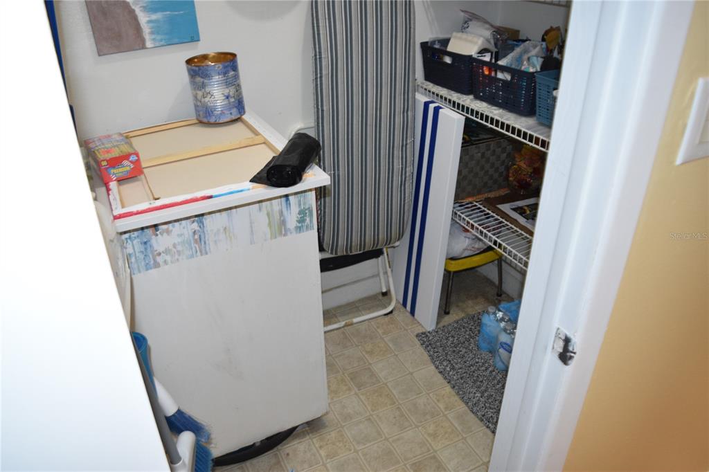 4746 Azalea Drive, Unit 208C New Port Richey, FL 34652 - Photo 14 of 56 a utility room with dryer and washer