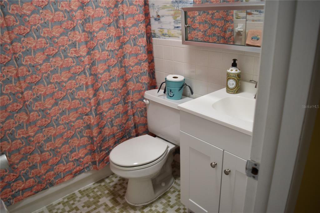 4746 Azalea Drive, Unit 208C New Port Richey, FL 34652 - Photo 22 of 56 a white toilet sitting next to a white sink