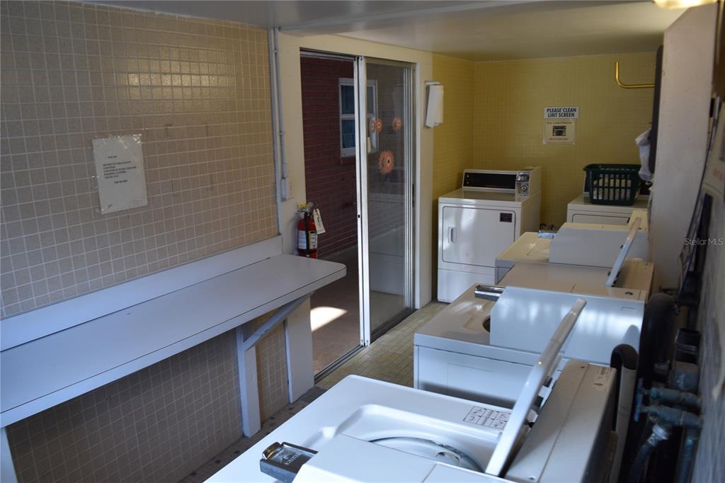 4746 Azalea Drive, Unit 208C New Port Richey, FL 34652 - Photo 48 of 56 a living room with furniture