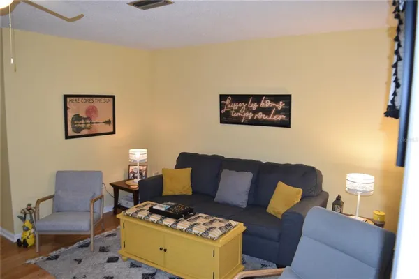 a living room with furniture and a couch