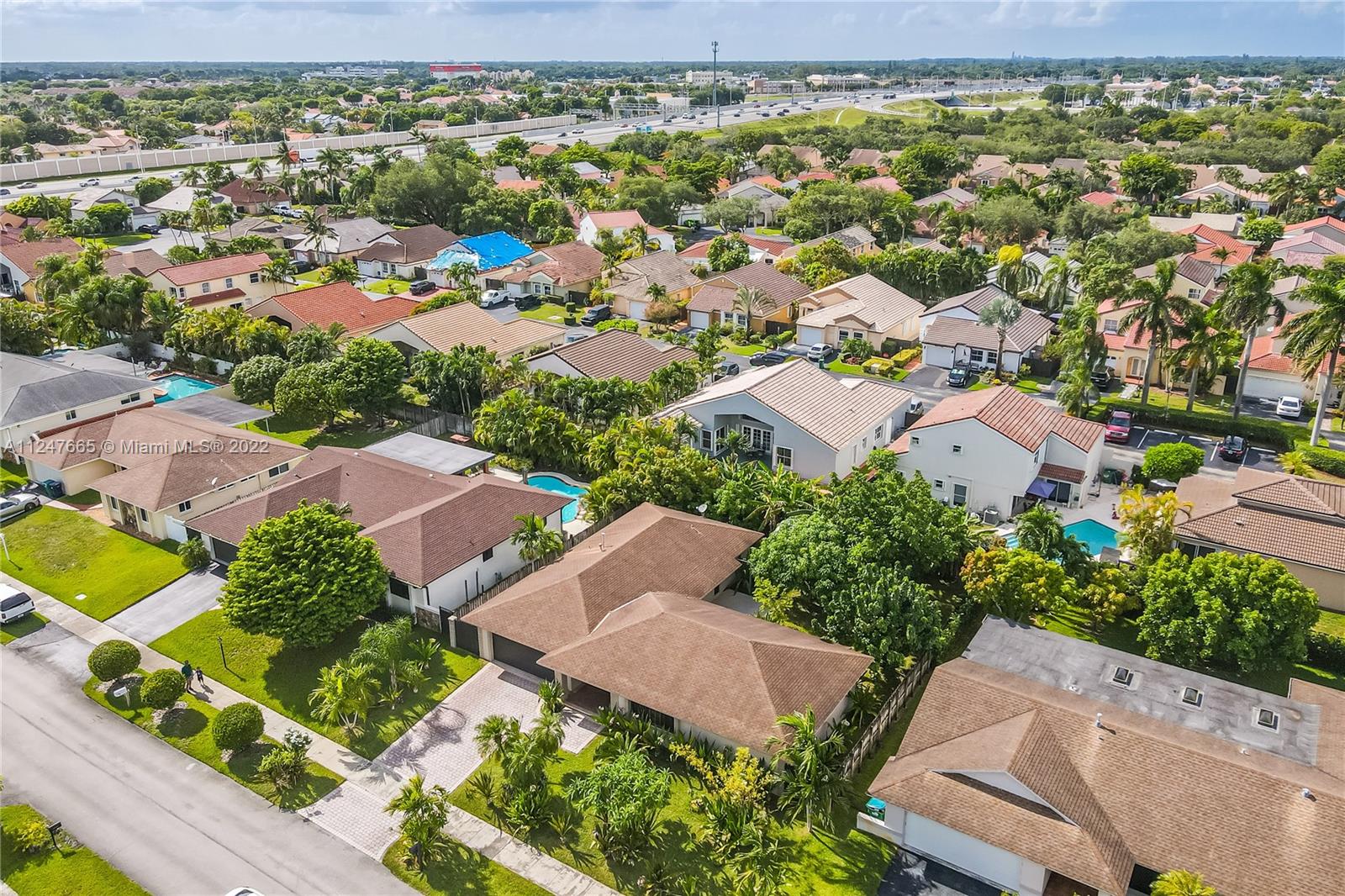 11809 Southwest 95th Street Miami, FL 33186 - Photo 25 of 25 an aerial view of residential houses with outdoor space