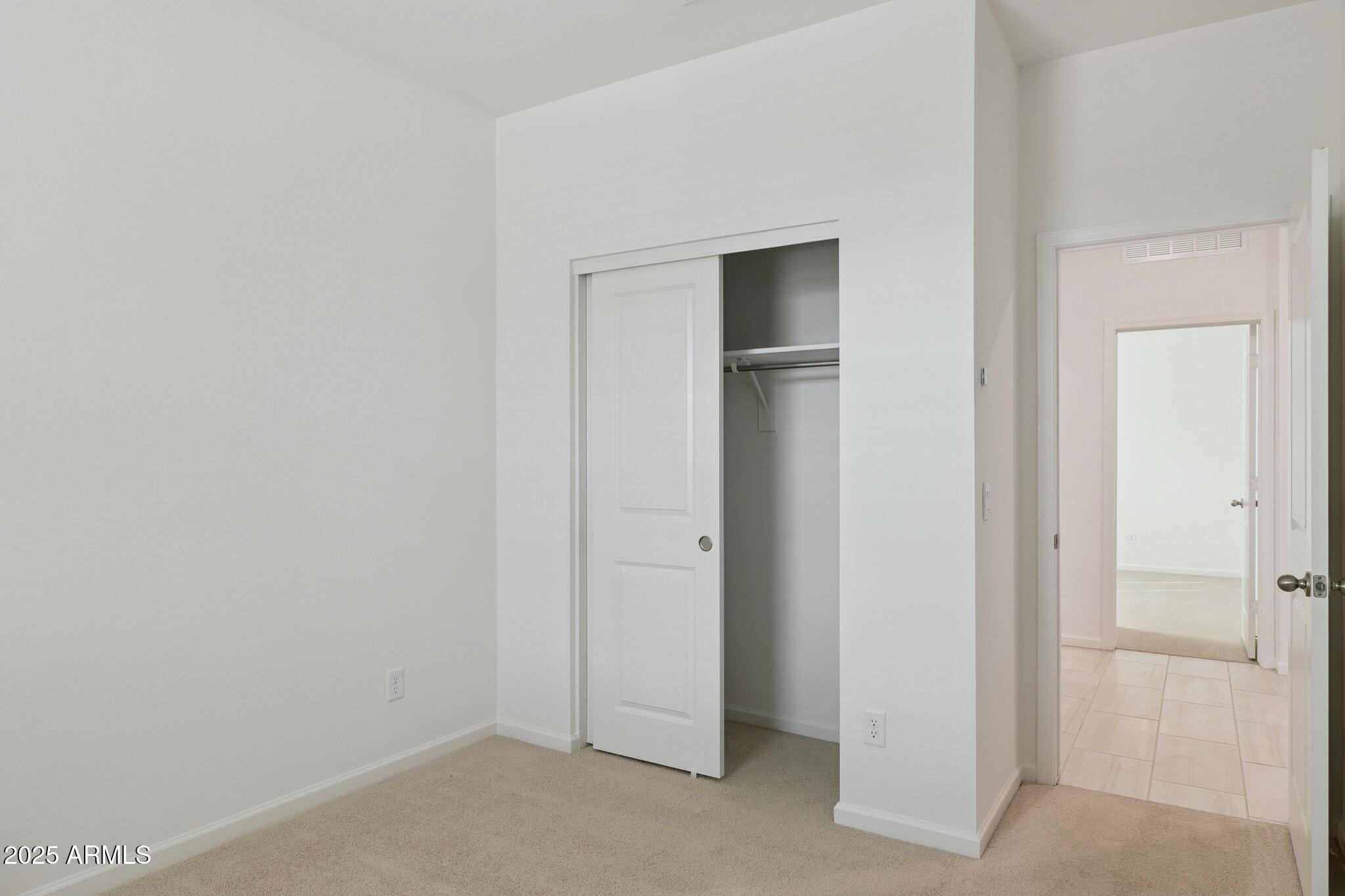 25453 West Fraktur Road Buckeye, AZ 85326 - Photo 9 of 18 a view of empty room